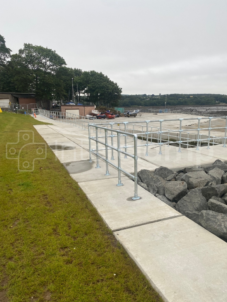 Interclamp modular key clamp barrier used to reinforce safety measures at a busy sailing club 